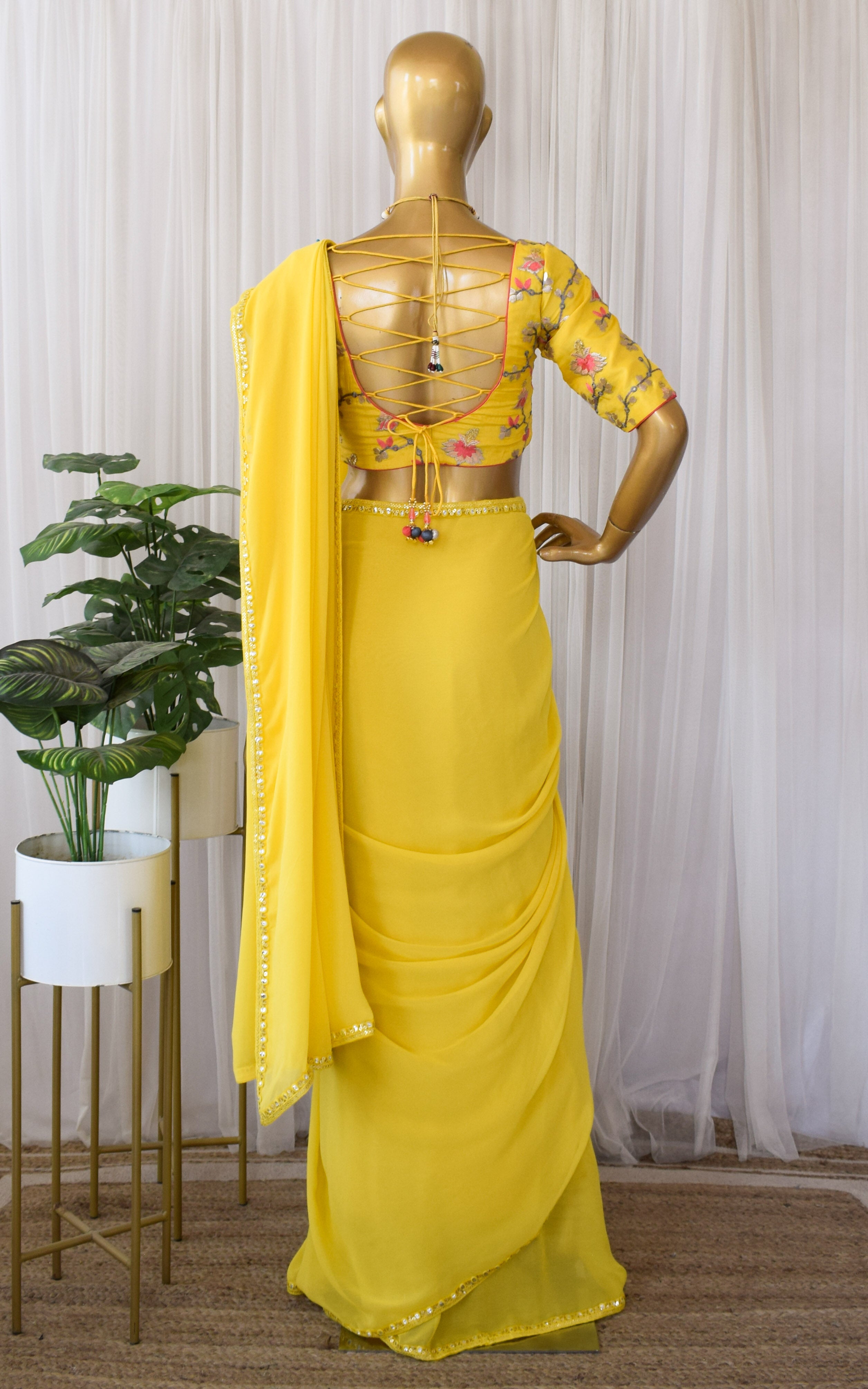 Yellow Georgette Saree with Emroidered Blouse