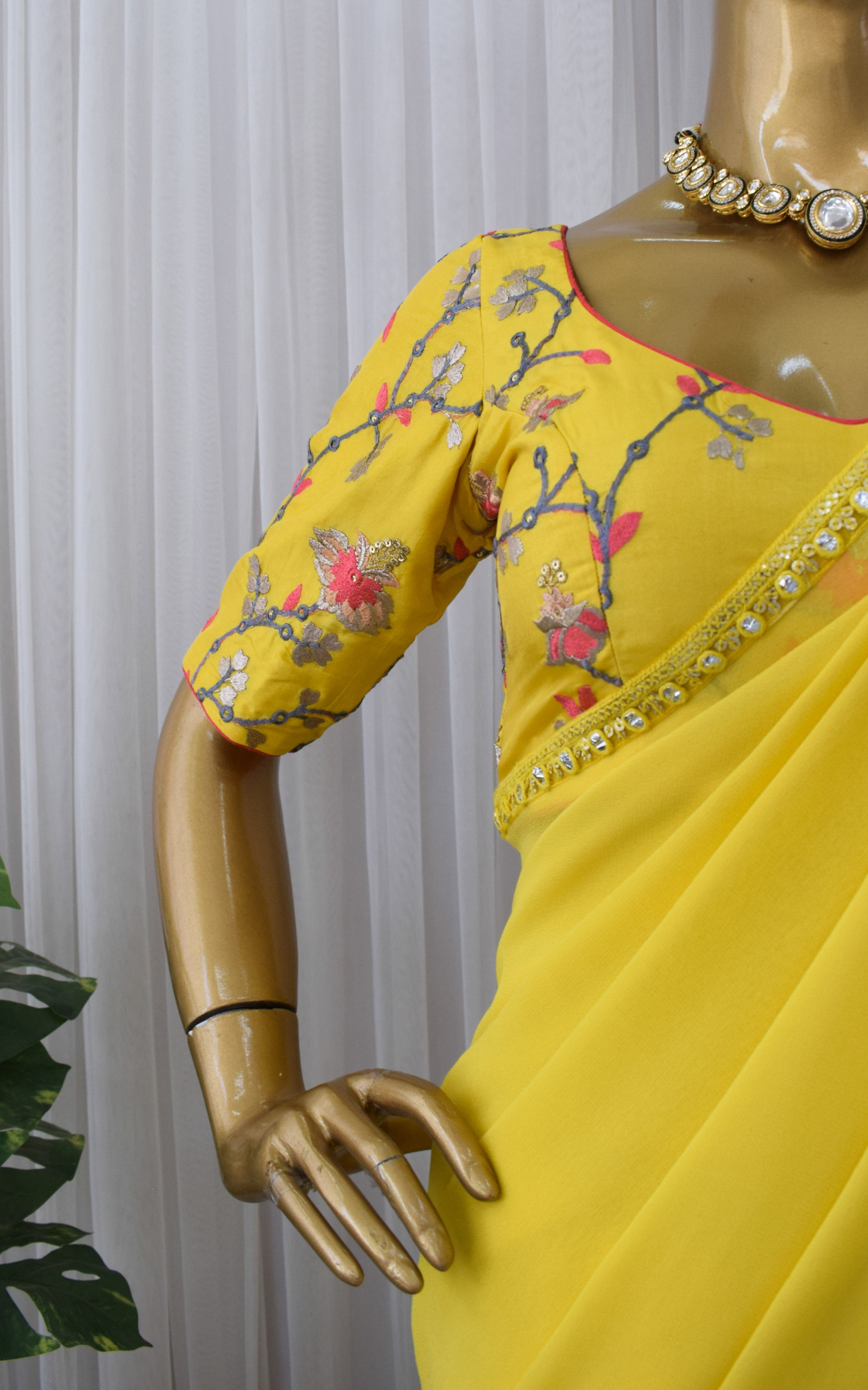 Yellow Georgette Saree with Emroidered Blouse
