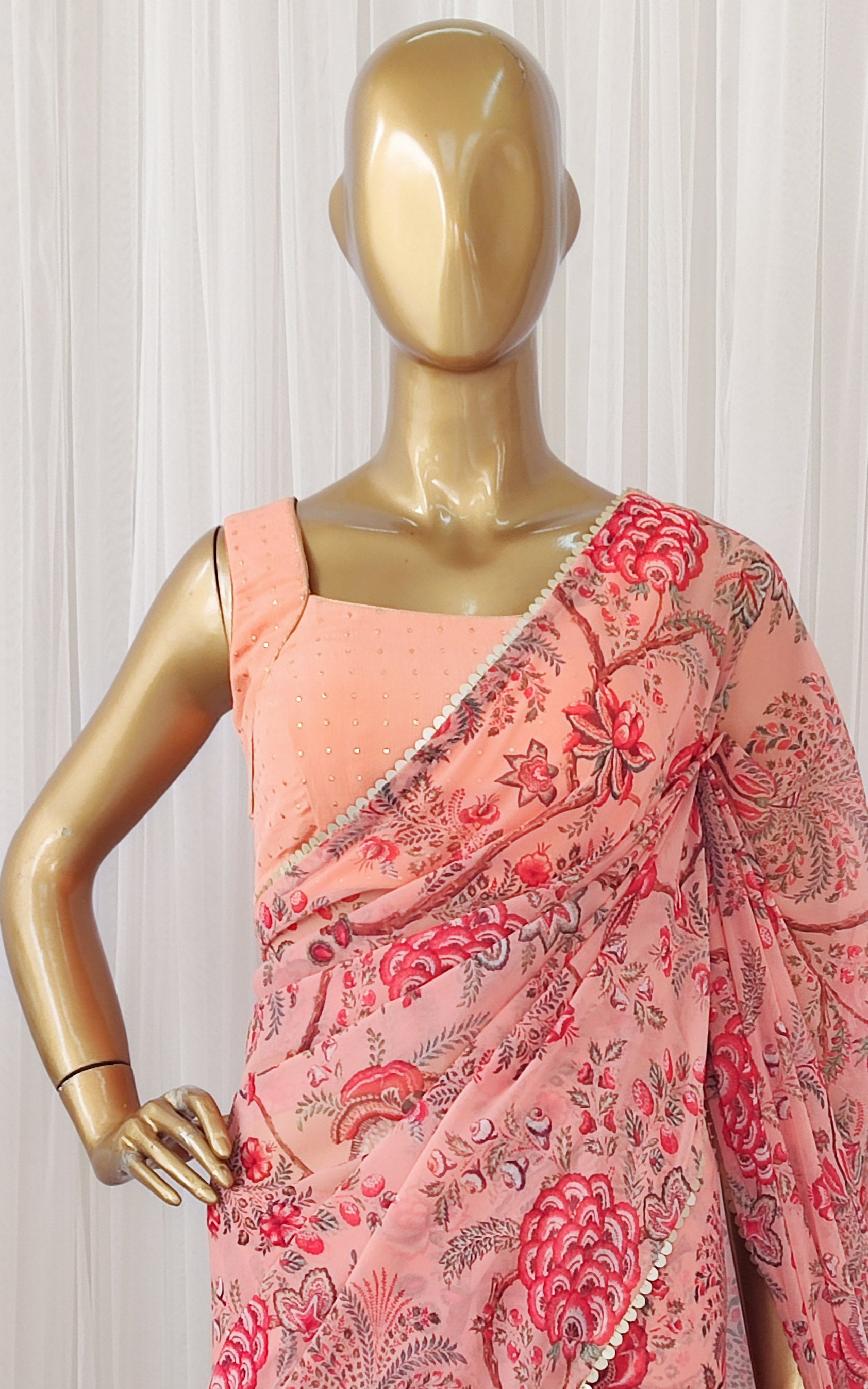 Peach Floral Georgette Saree with Mukaish Blouse