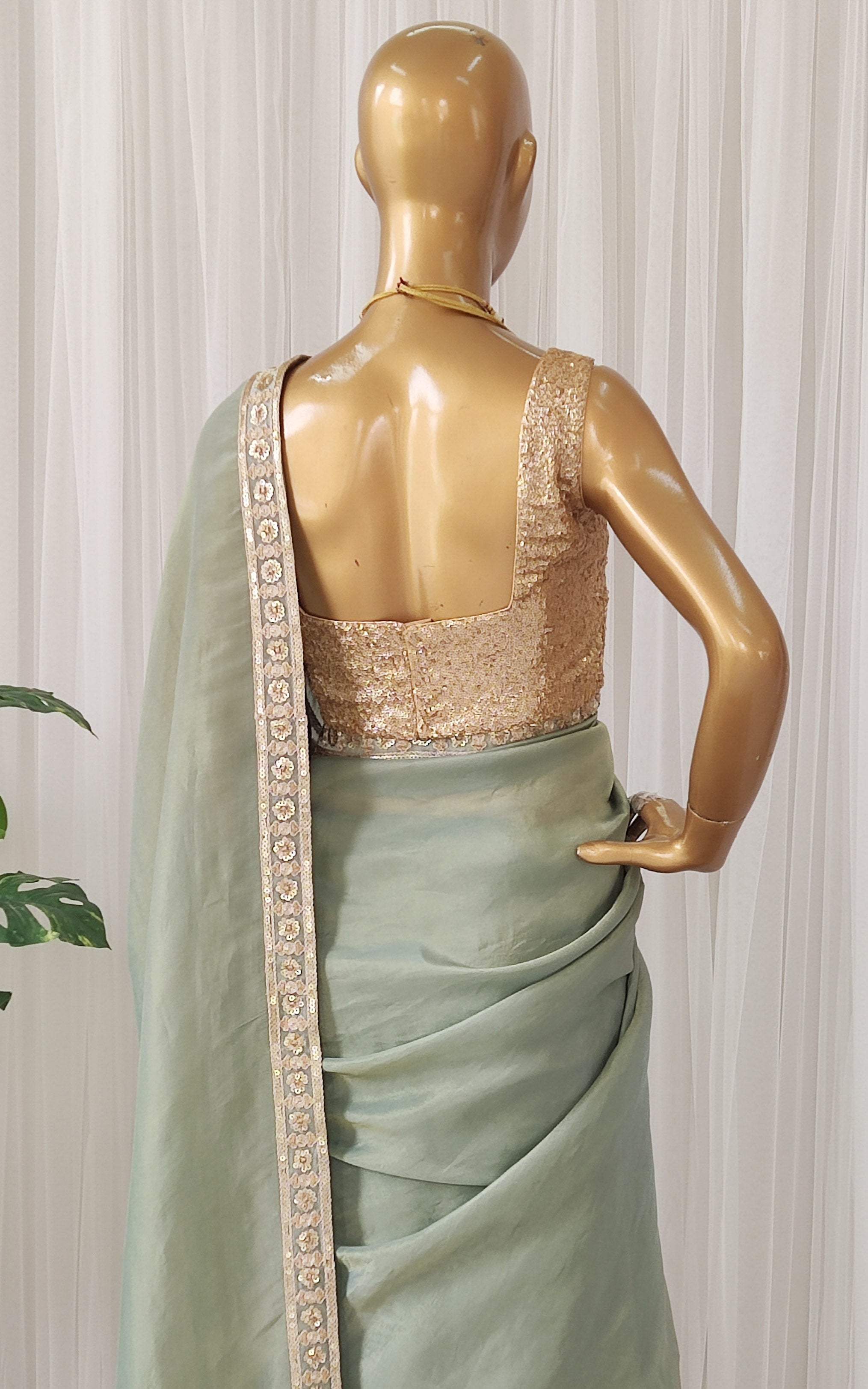 Seafoam Green Tissue Georgette Saree with Gold Sequinned Blouse