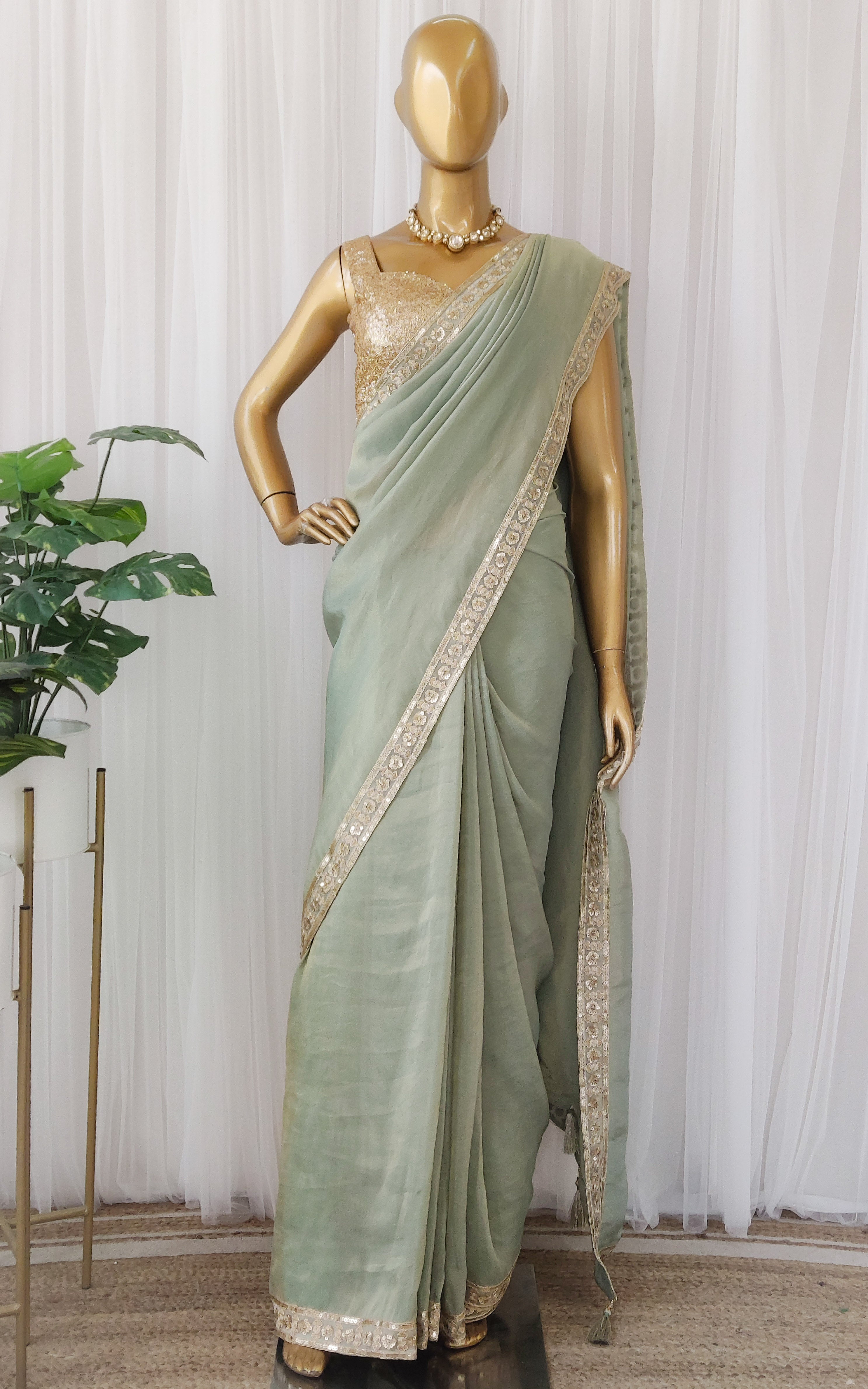 Seafoam Green Tissue Georgette Saree with Gold Sequinned Blouse
