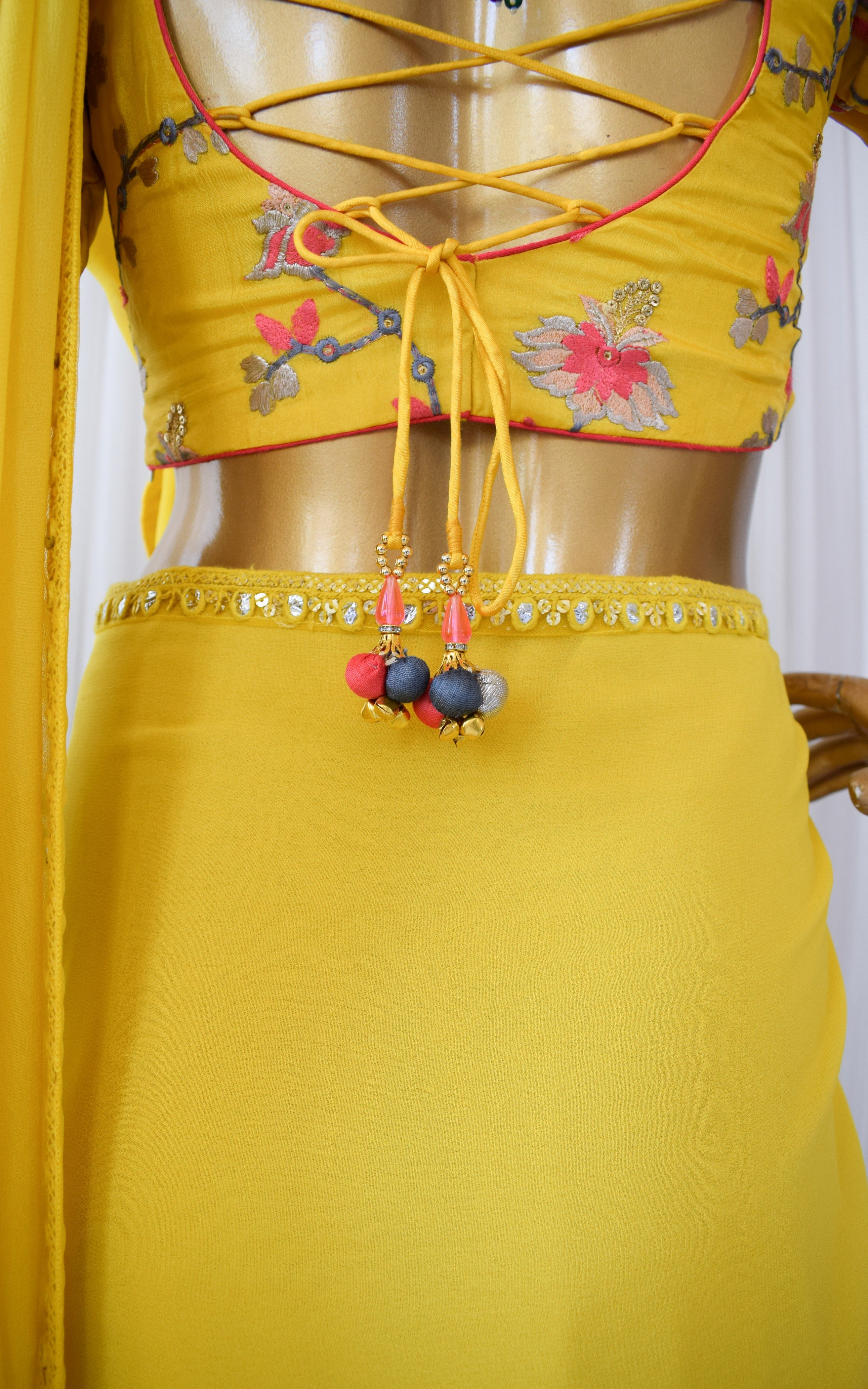 Yellow Georgette Saree with Emroidered Blouse
