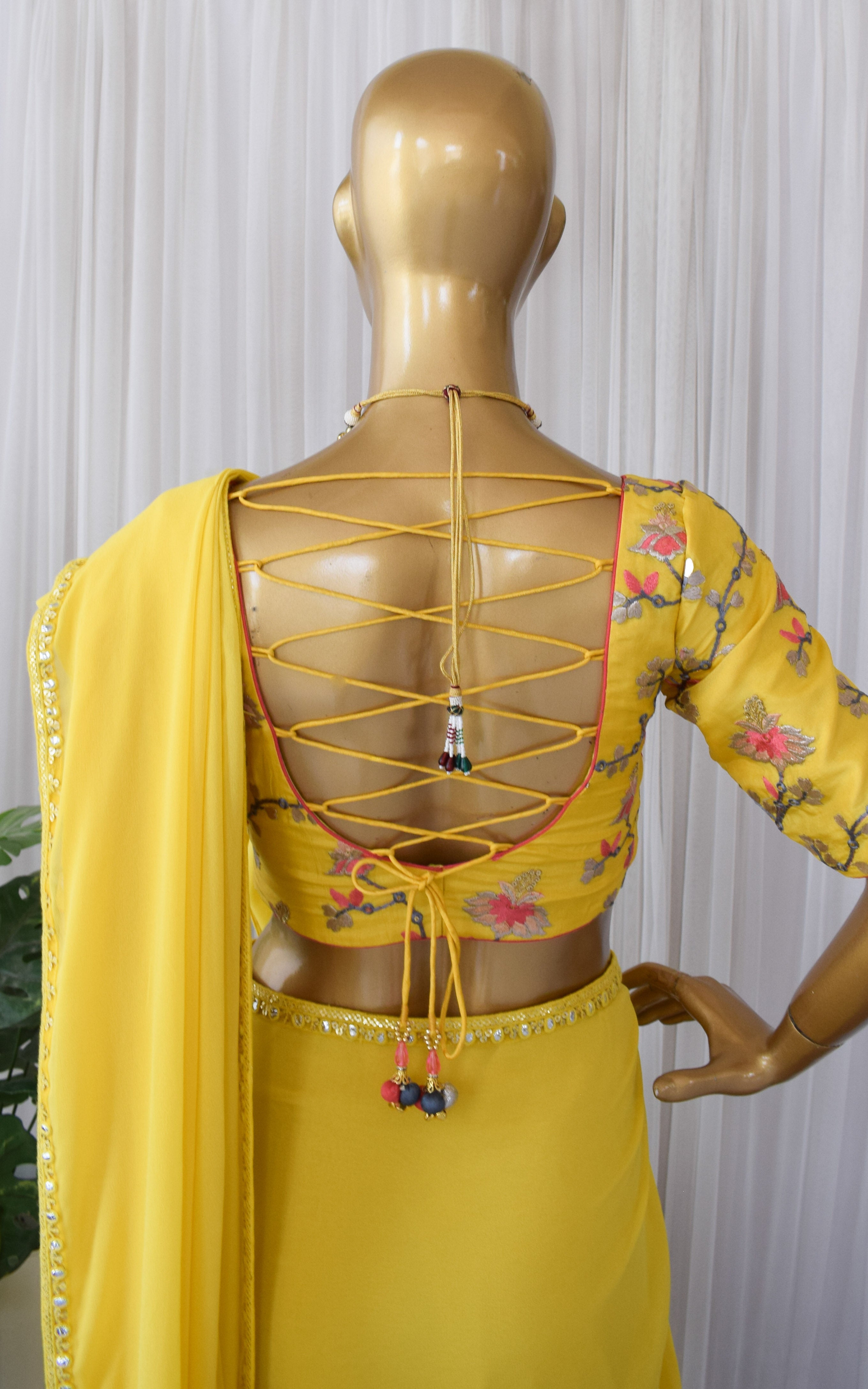 Yellow Georgette Saree with Emroidered Blouse