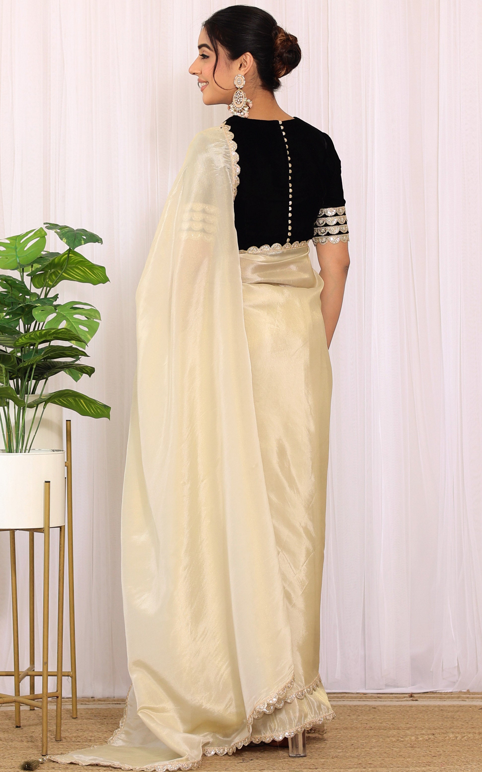 Roopal Golden Tissue Saree with Black Velvet Blouse