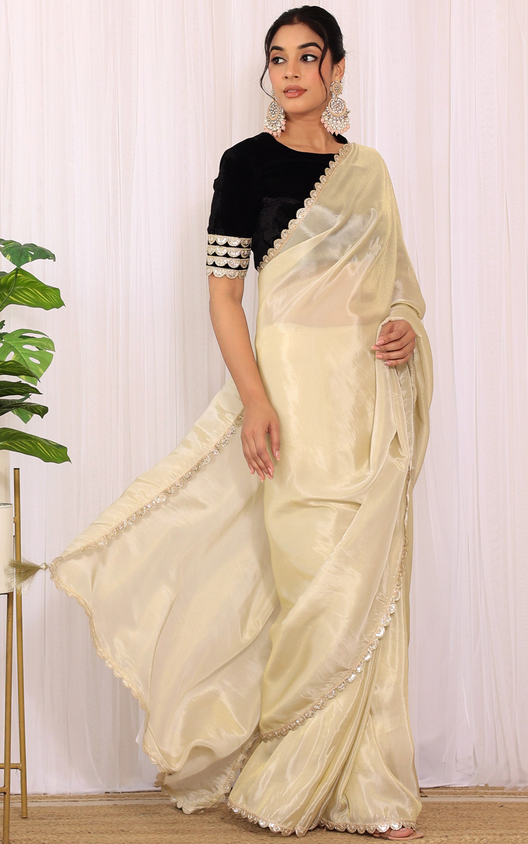 Roopal Golden Tissue Saree with Black Velvet Blouse