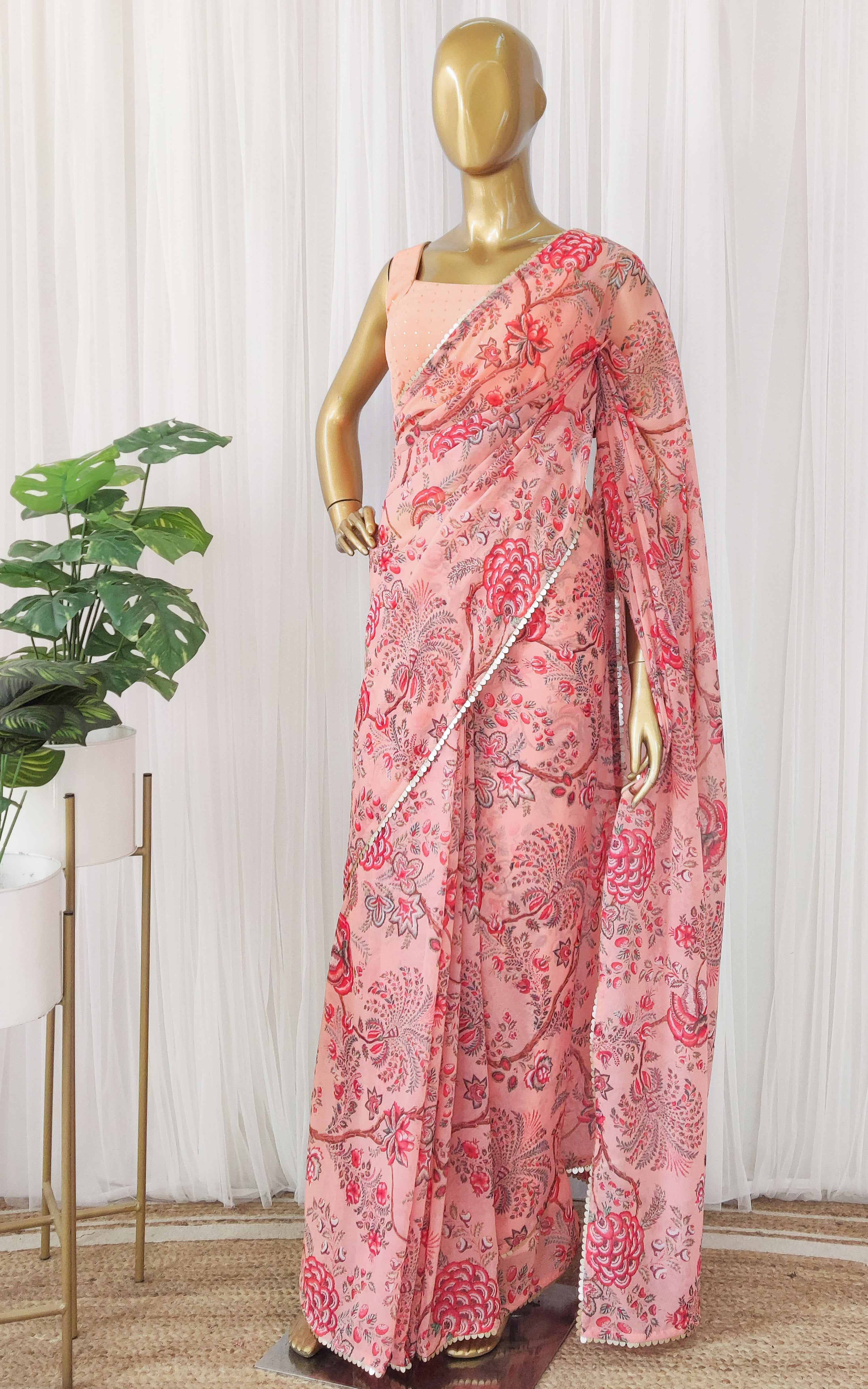 Peach Floral Georgette Saree with Mukaish Blouse