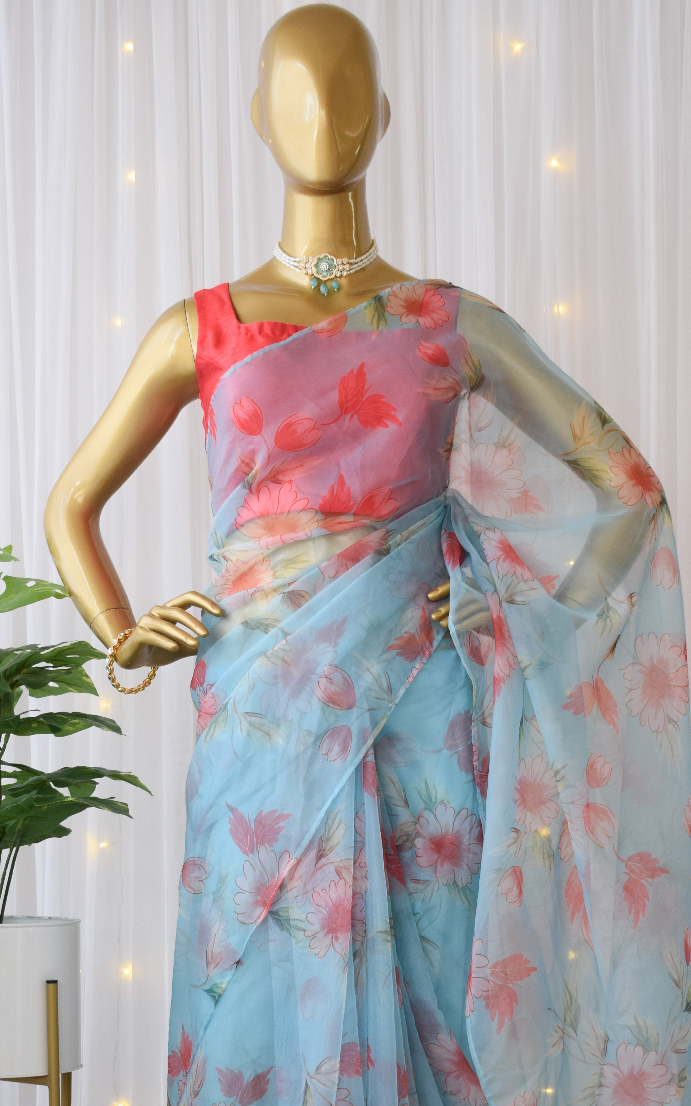 Gulnar Sky Blue Organza Saree