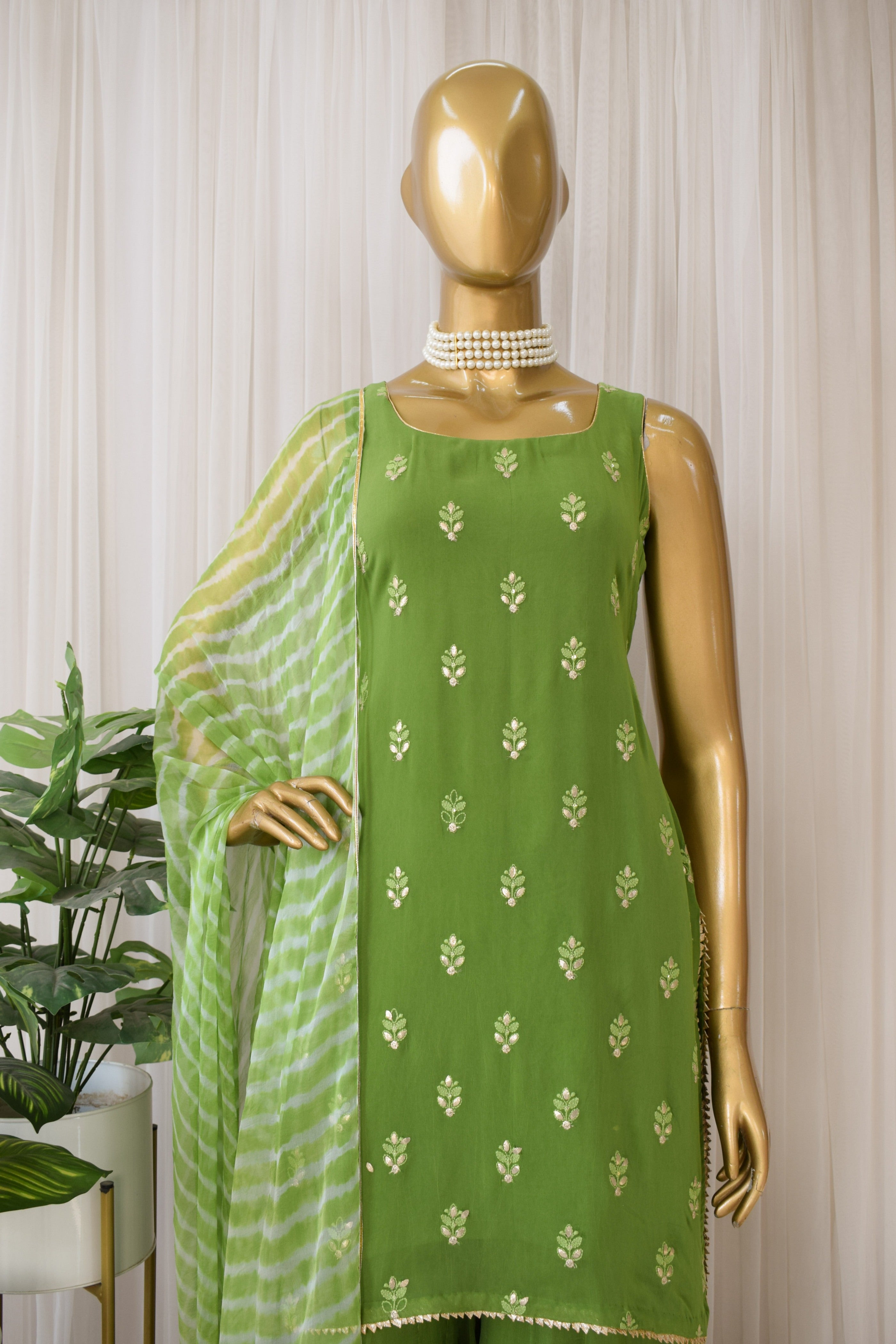 Arti Chauhan Henna Green Chikankari Sharara Set With Leheriya Dupatta