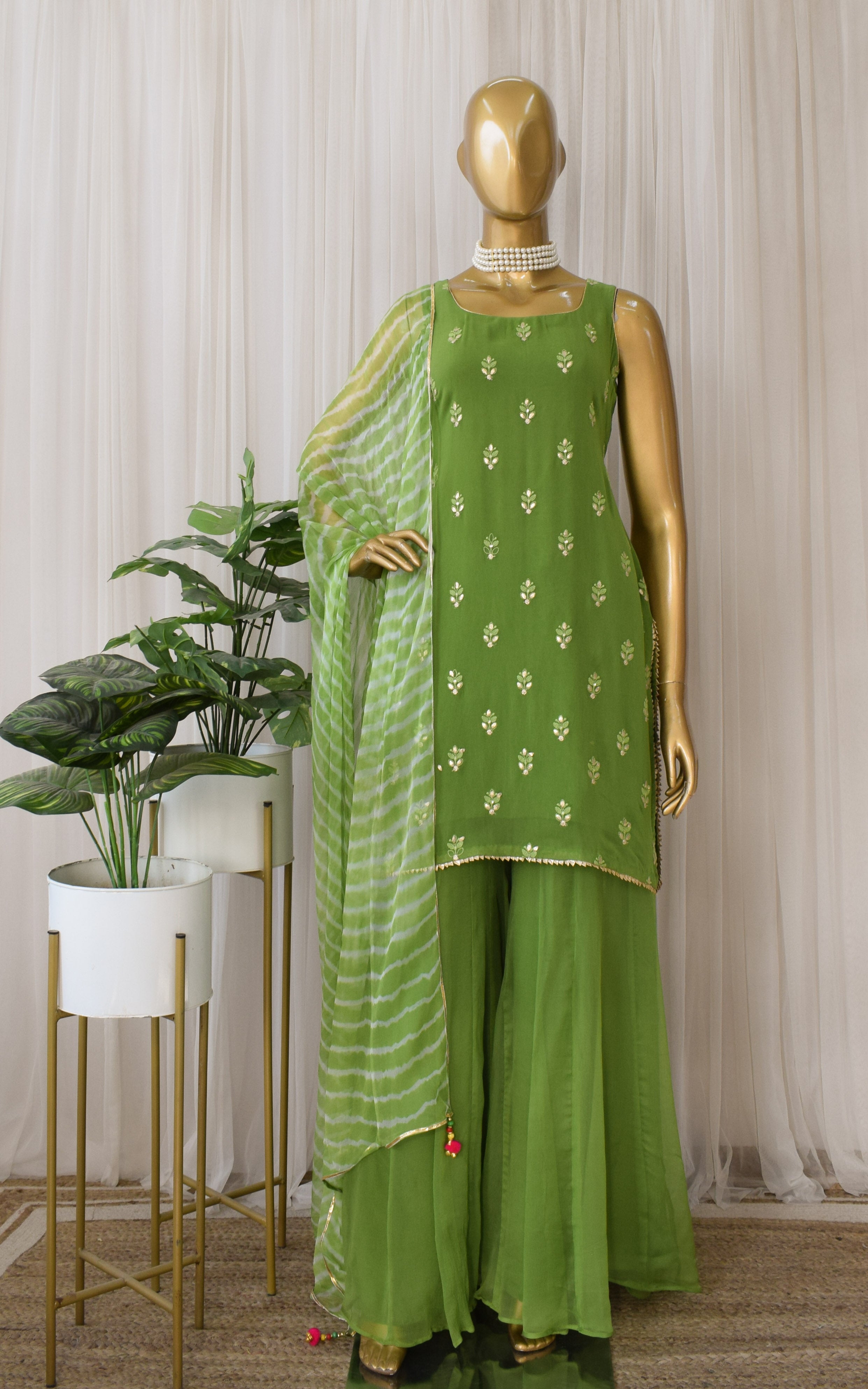 Arti Chauhan Henna Green Chikankari Sharara Set With Leheriya Dupatta