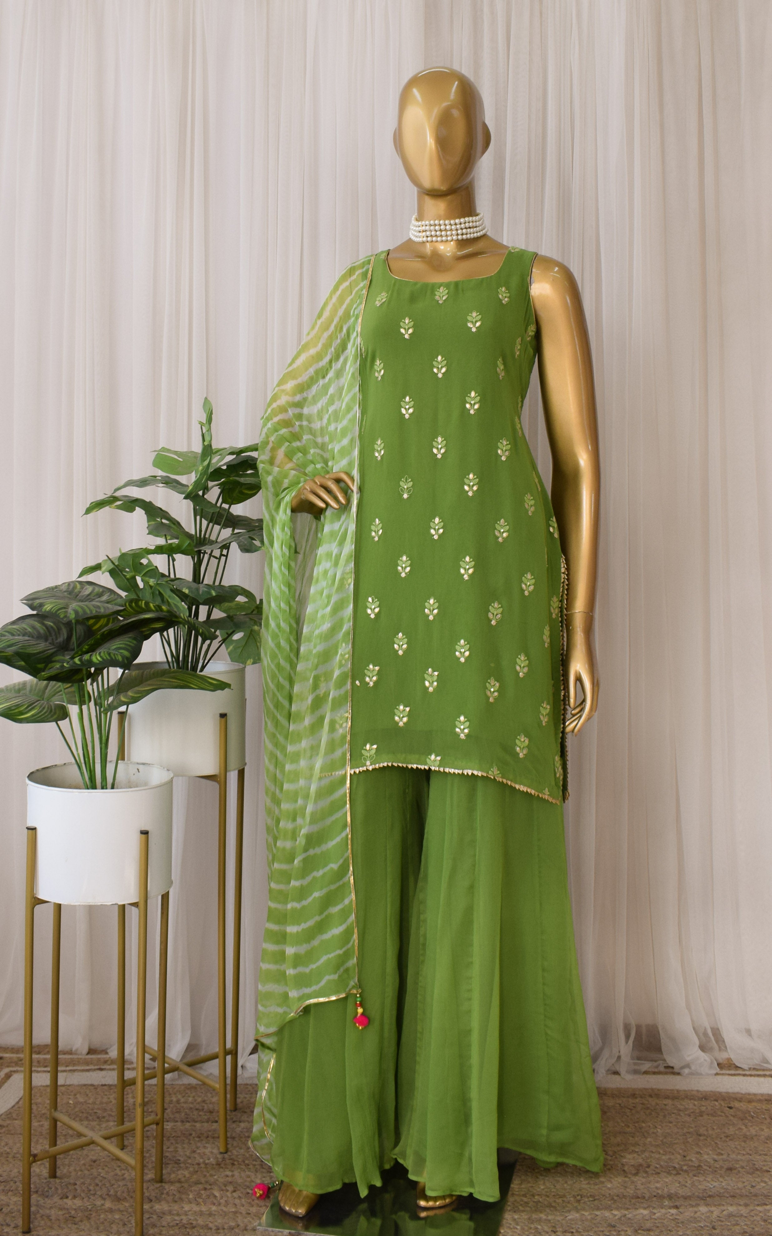 Arti Chauhan Henna Green Chikankari Sharara Set With Leheriya Dupatta